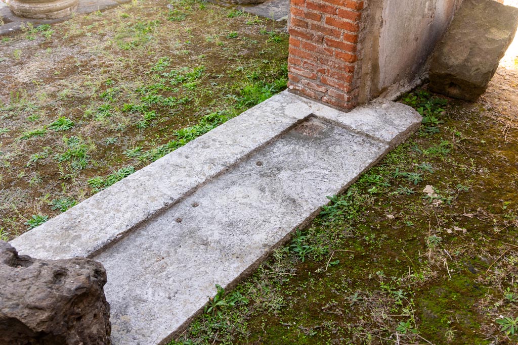 VIII.7.28 Pompeii. October 2023. Looking south-east towards doorway threshold in cella. Photo courtesy of Johannes Eber.