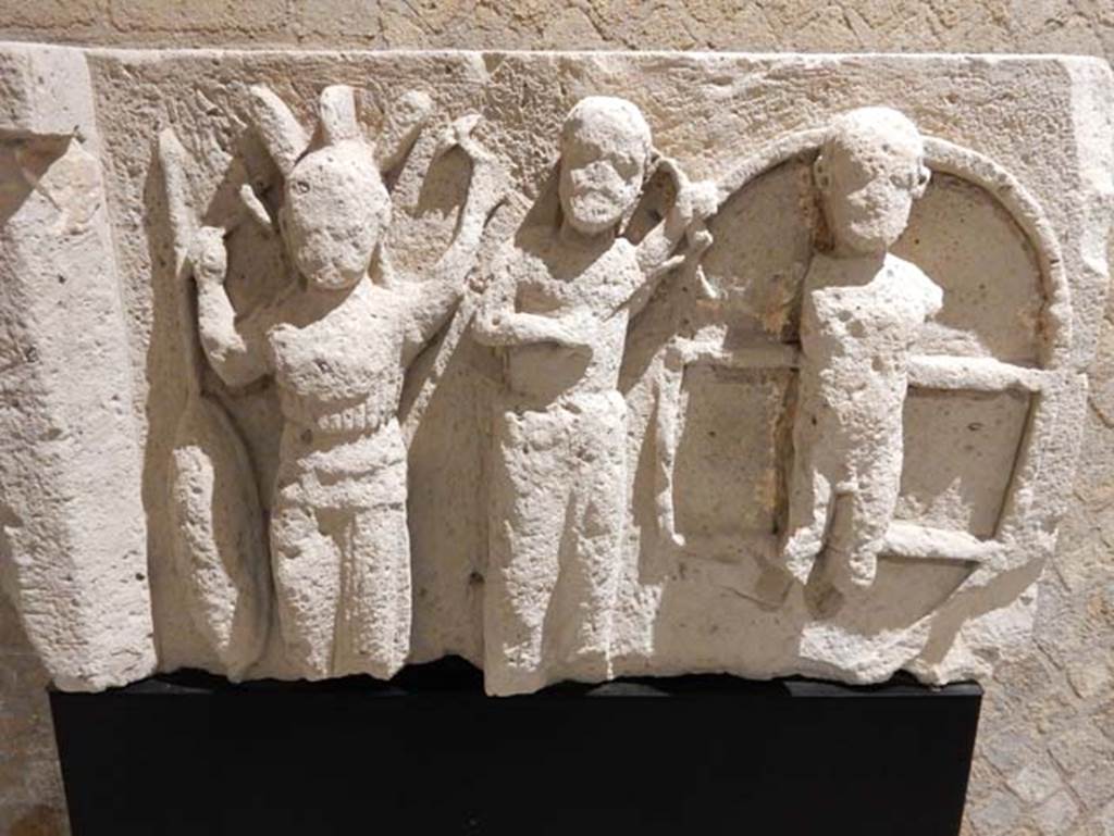 VIII.7.31 Pompeii, May 2018. This group has been identified as Athena, perhaps Hermes, and a half-naked figure. Photo courtesy of Buzz Ferebee.
