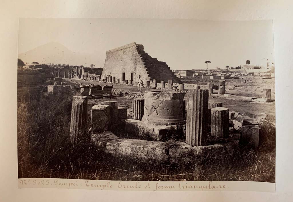 VIII.7.32 Pompeii. Album by M. Amodio, c.1880, entitled “Pompei, destroyed on 23 November 79, discovered in 1748”.
Looking north-east from Tholos towards west side of Large Theatre. Photo courtesy of Rick Bauer.