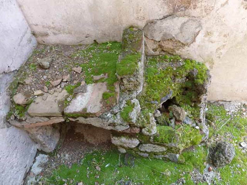 IX.1.4 Pompeii. May 2010. Remains of hearth in south-east corner of rear room.