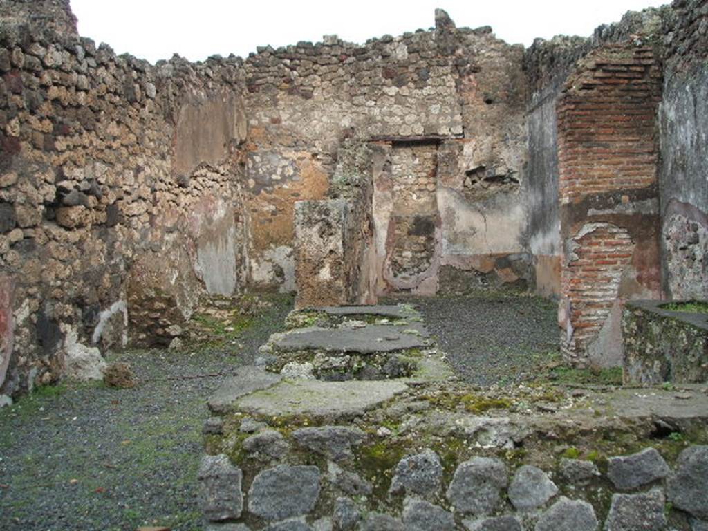 IX.1.8 Pompeii. December 2004. Looking east across bar to rear rooms.
