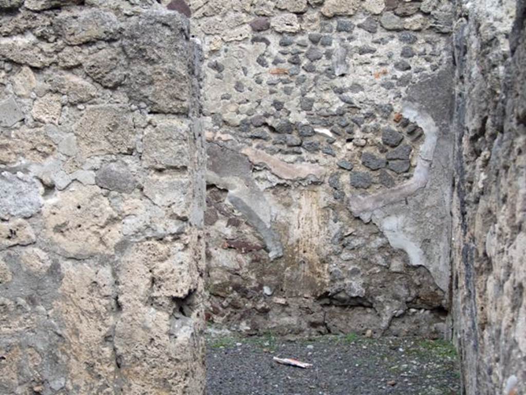 IX.1.9 Pompeii. Shop. December 2007. East wall of rear room, through doorway from shop.