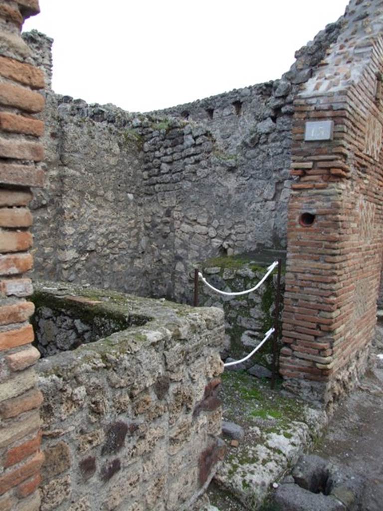 IX.1.13 Pompeii. December 2007. Entrance and south wall and pilaster between IX.1.13 and IX.1.14. Graffiti were found on this pilaster in June 1853, see IX.1.14.