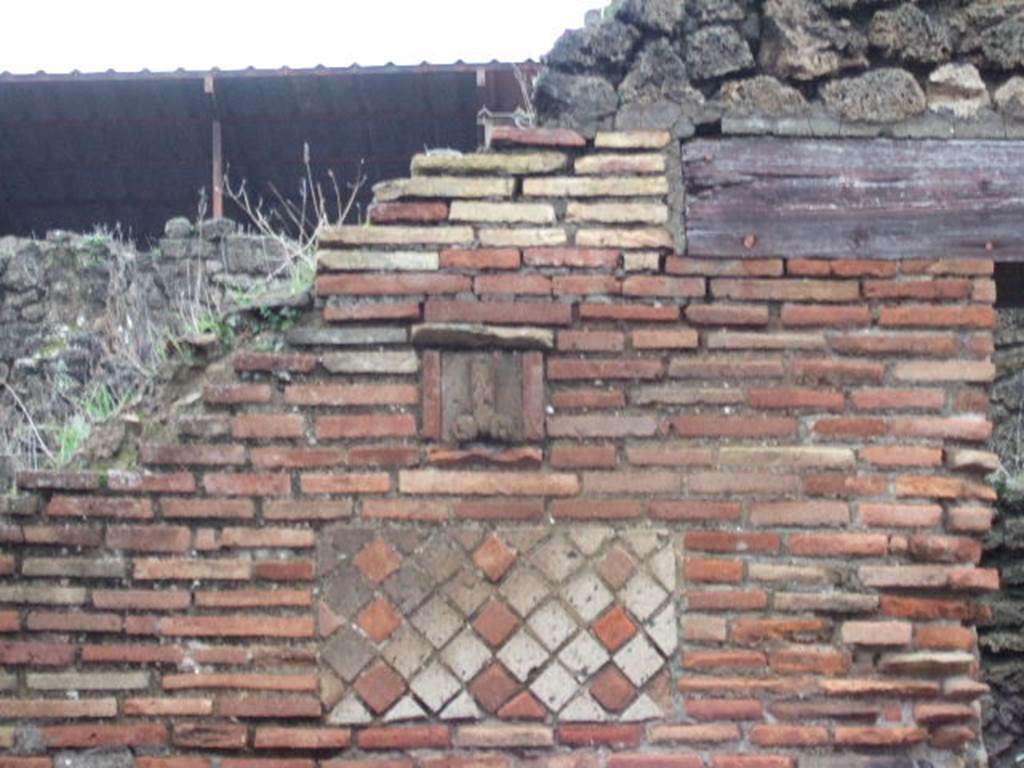 Plaque between IX.1.13 and IX.1.14. December 2005.