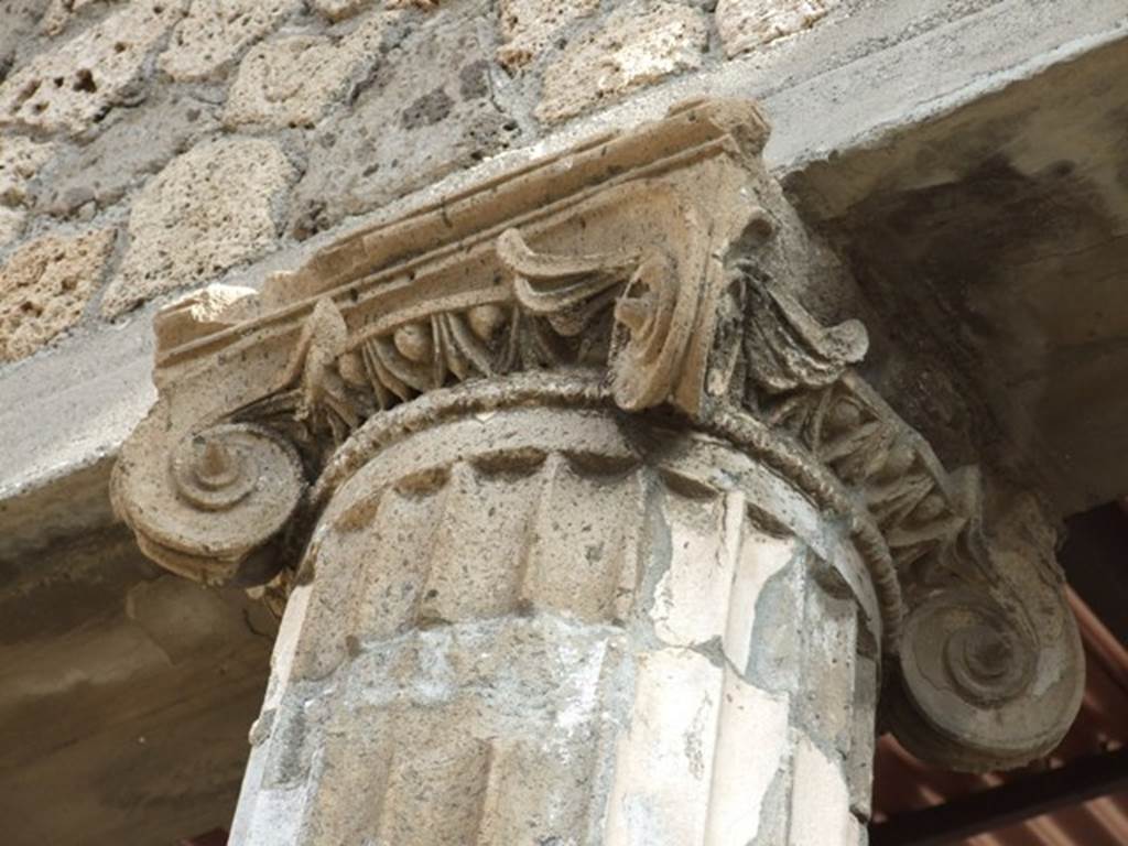 IX.1.20 Pompeii. December 2007. Room 2, east side of atrium. Ionic column capital.