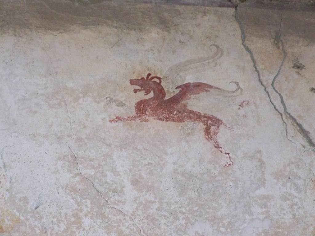 IX.1.20 Pompeii. December 2007. Room 18, ala, painting of winged griffin from the south wall.
