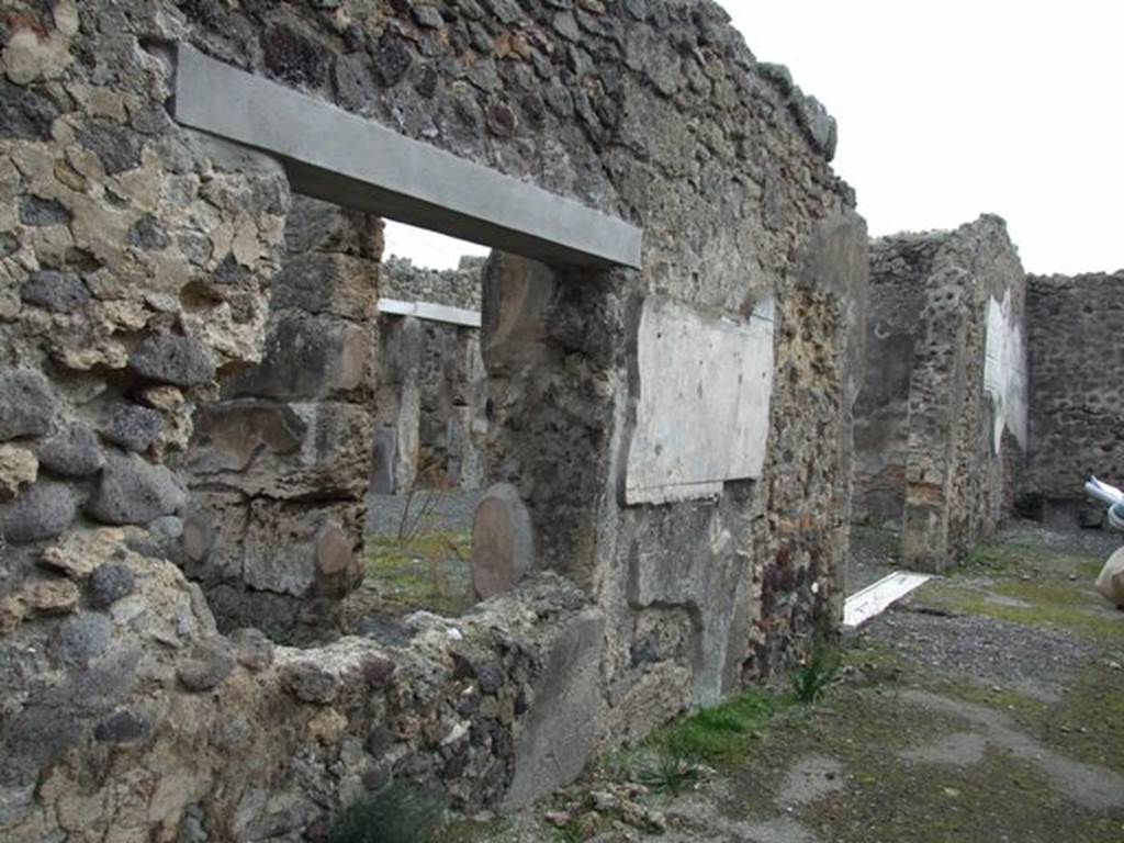 IX.1.22 House of M. Epidi Sabini.  December 2007.  Room 24.  Second peristyle.  Looking south along east wall of peristyle and through window of room 28.