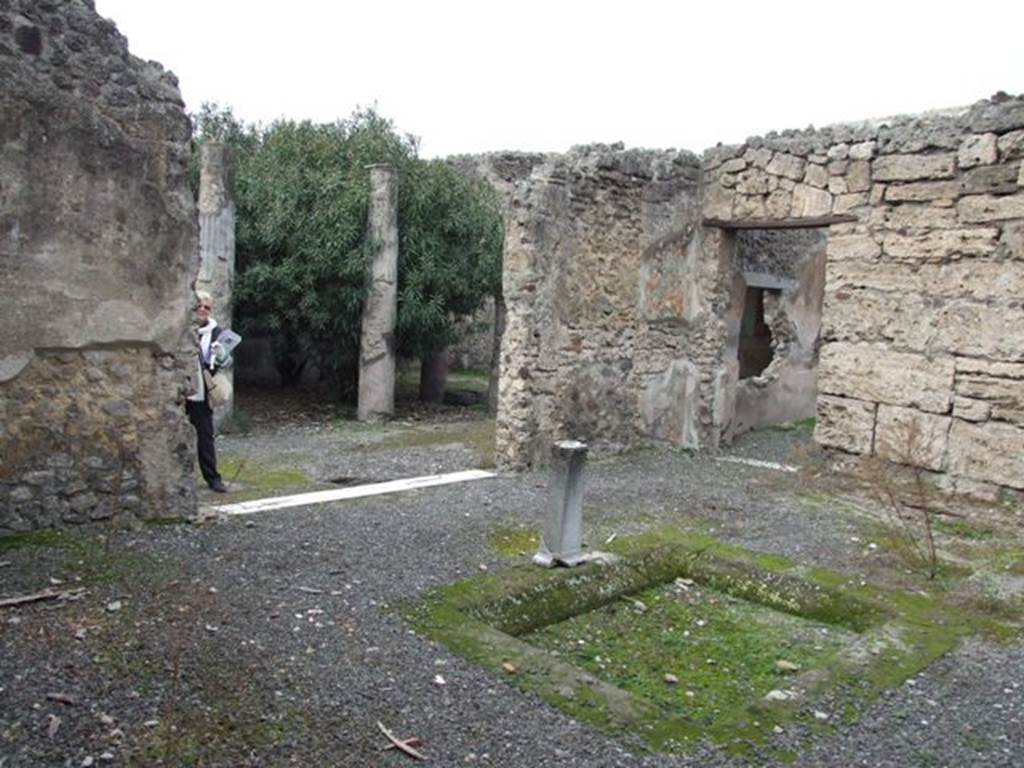 IX.1.22 House of M. Epidi Sabini.  December 2007.  Room 27.  Second atrium.  Looking north west across impluvium to second peristyle and room 28.