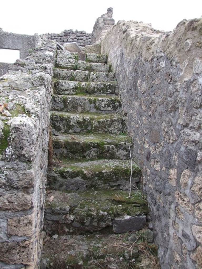 IX.2.10 Pompeii. December 2007. Looking south to stone staircase to upper floor.