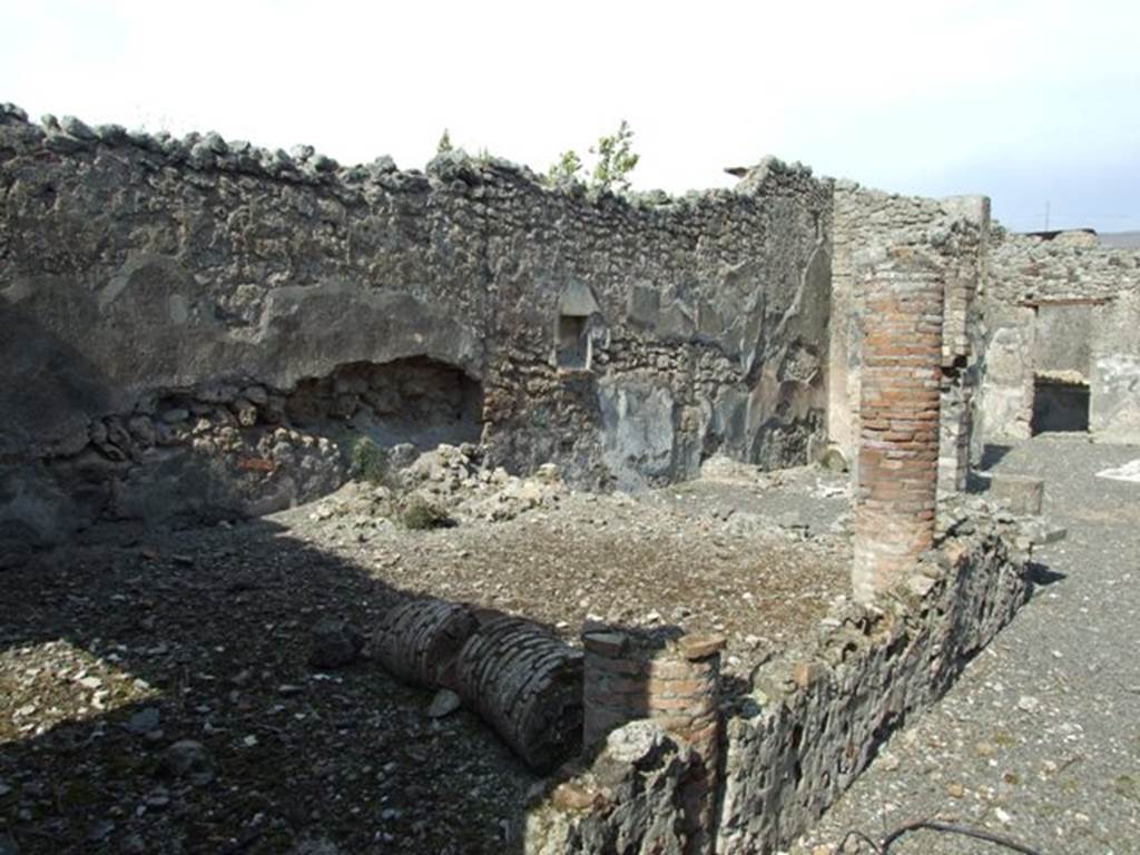 IX.2.18 Pompeii. March 2009. Room 11. Garden area. Looking east along line of three columns and low wall, towards East Portico.