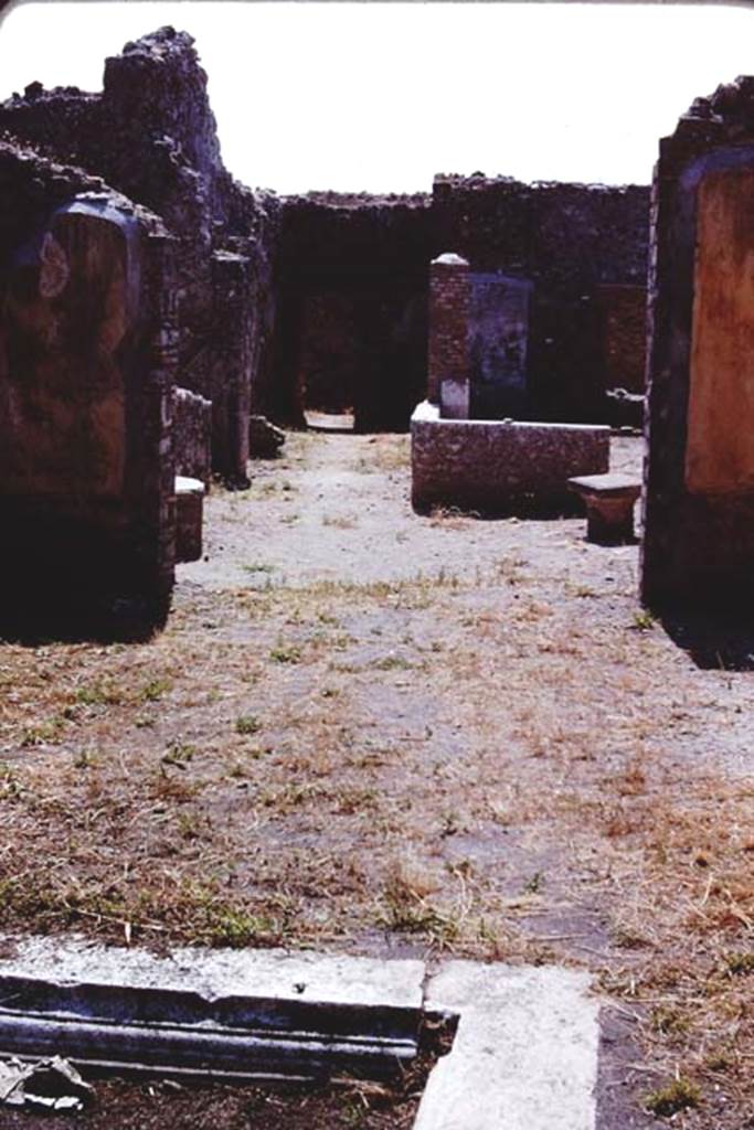IX.2.18 Pompeii. 1966. Looking west across impluvium in atrium and through tablinum to the garden area. Photo by Stanley A. Jashemski.
Source: The Wilhelmina and Stanley A. Jashemski archive in the University of Maryland Library, Special Collections (See collection page) and made available under the Creative Commons Attribution-Non Commercial License v.4. See Licence and use details.
J66f1004