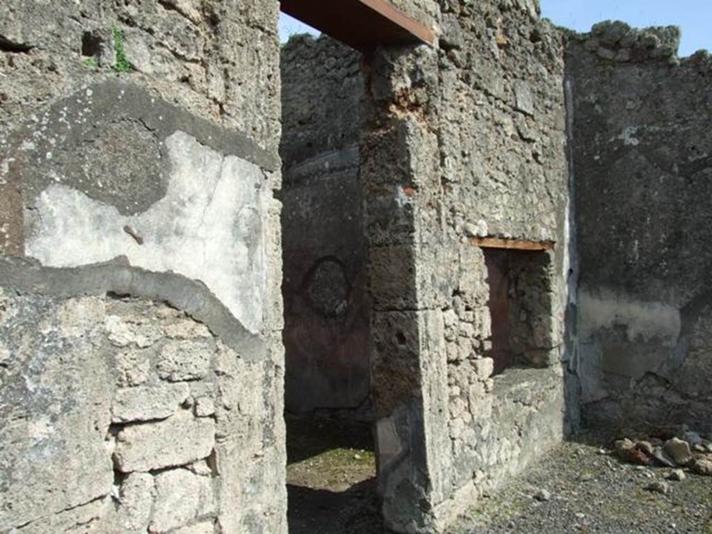 IX.2.18 Pompeii. March 2009. Doorway and window to room 3, triclinium or cubiculum.
According to Fiorelli, and PPM, this room was a triclinium.
See Fiorelli, G: Descrizione di Pompei, 1875, (p.385).
According to PPP, and Eschebach, this room was a cubiculum.
See Bragantini, de Vos, Badoni, 1986. Pitture e Pavimenti di Pompei, Parte 3. Rome: ICCD. (p.419)
See Eschebach, L., 1993. Gebäudeverzeichnis und Stadtplan der antiken Stadt Pompeji. Köln: Böhlau. (p.409)