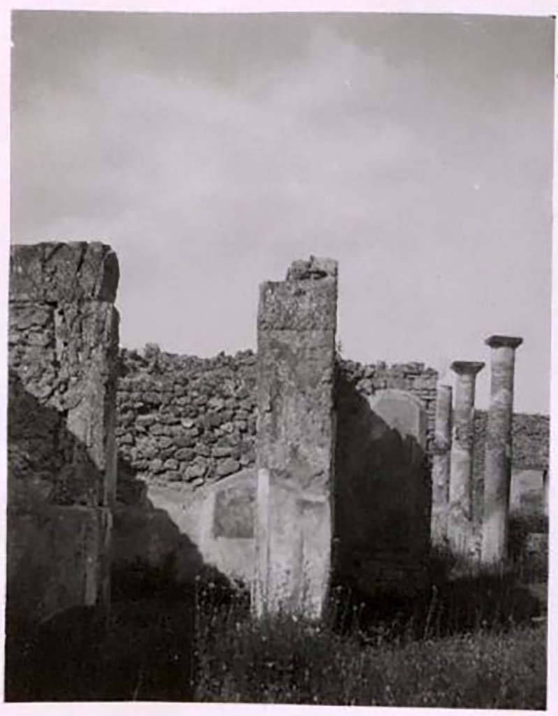 IX.2.18 Pompeii. Pre-1943. Photo by Tatiana Warscher.
Looking across atrium towards doorway to room 4, on left. The south side of the tablinum is on the right.
See Warscher, T. Codex Topographicus Pompeianus, IX.2. (1943), Swedish Institute, Rome. (no.98.), p. 179.
