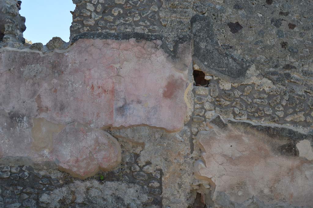 IX.2.26 Pompeii. March 2019.
Front façade, detail of red and black painted panels, below kitchen window on west side of doorway.
On the right would be IX.2.27.
Foto Taylor Lauritsen, ERC Grant 681269 DÉCOR.