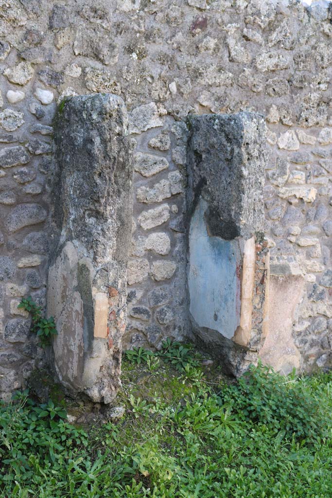 IX.2.27 Pompeii. December 2018. 
Looking north-west towards remains of shrine against west wall of peristyle. Photo courtesy of Aude Durand.

