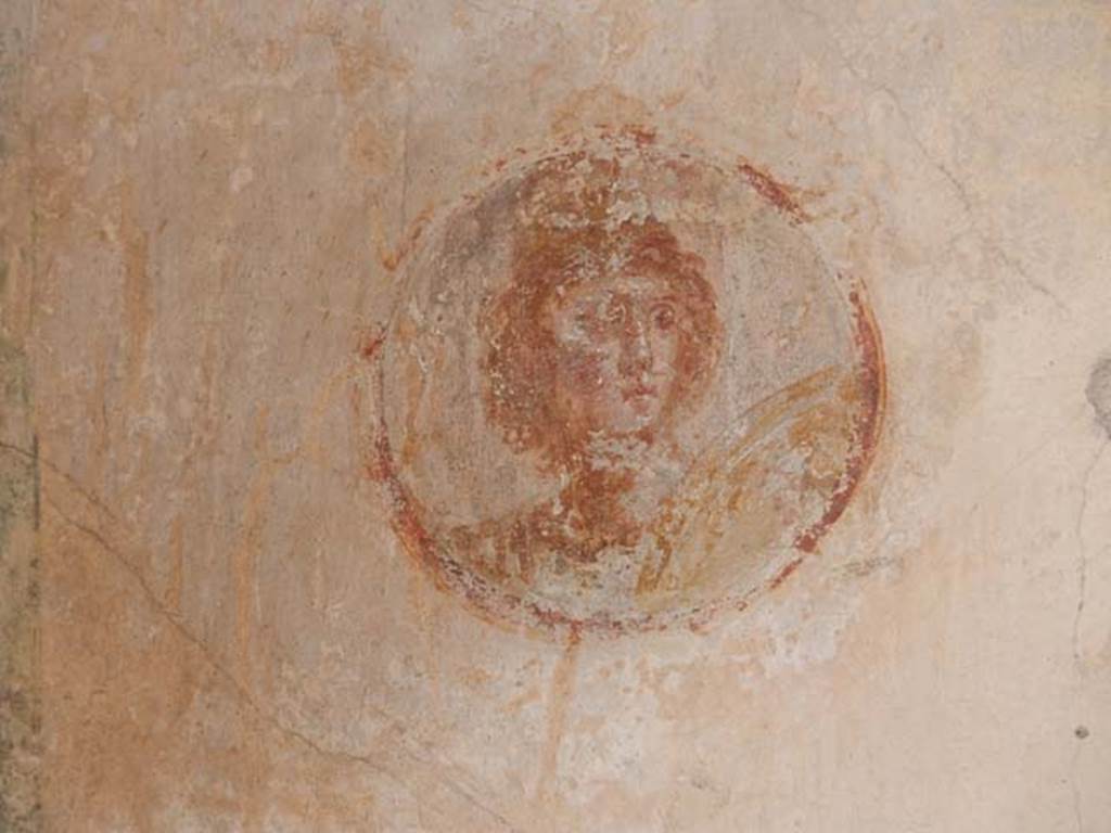 IX.3.5 Pompeii. May 2015. Room 5, west end of north wall. Bust of Mars or Ares with shield. Photo courtesy of Buzz Ferebee.