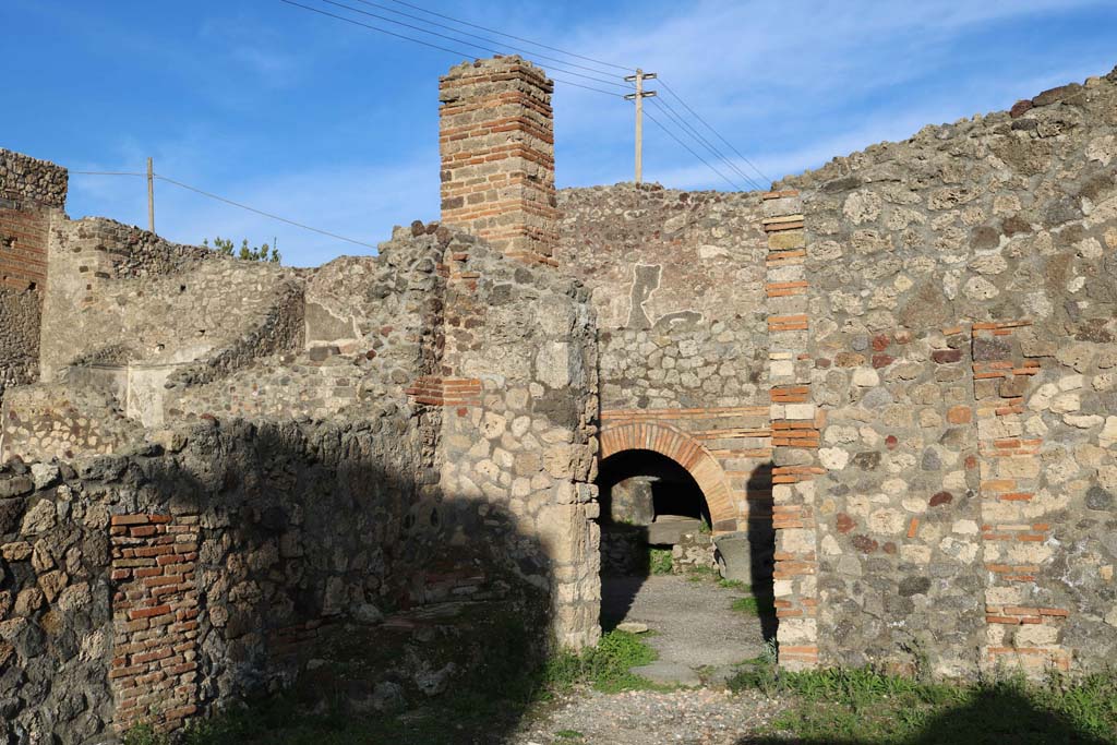 IX.3.10 Pompeii. December 2018. Looking east from shop-room towards bakery. Photo courtesy of Aude Durand.


