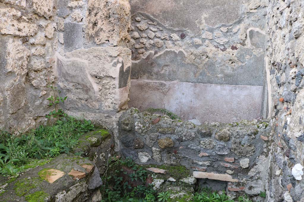 IX.3.14 Pompeii. December 2018. Hearth and water reservoir at north end of corridor. Photo courtesy of Aude Durand.