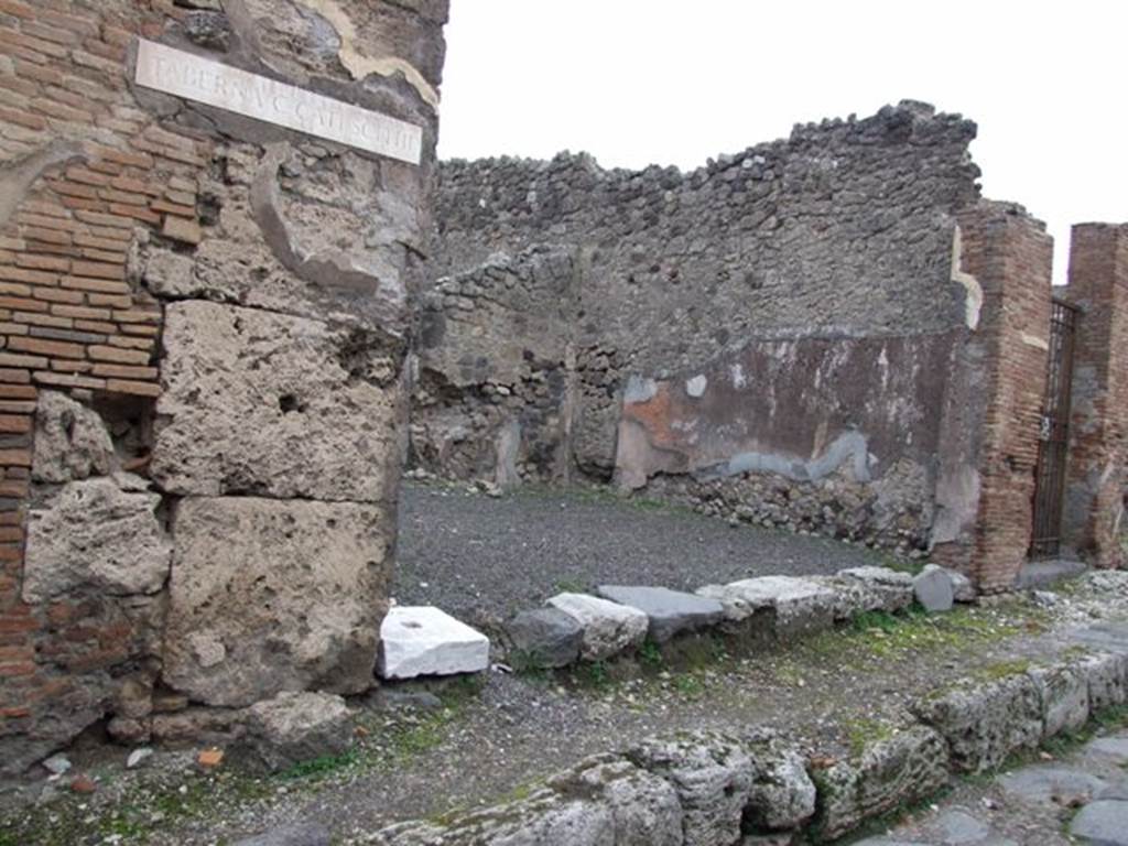 IX.3.14 Pompeii. December 2007. Entrance doorway, looking towards east wall and pilaster between IX.3.14 and 15.