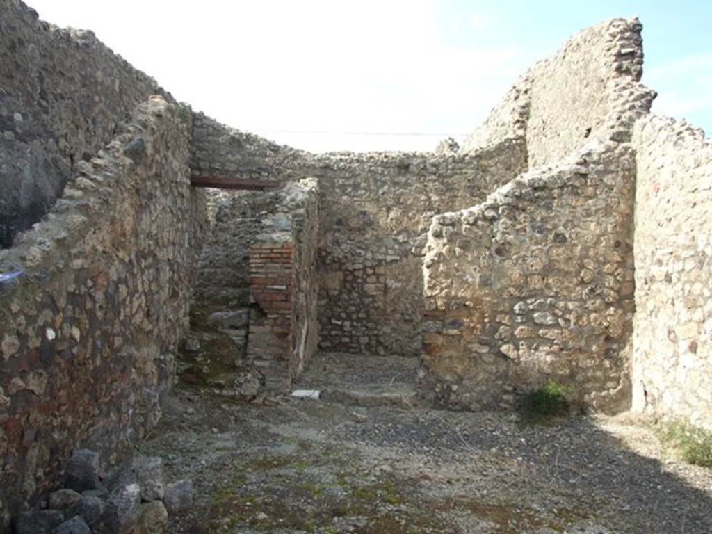IX.3.16 Pompeii.  March 2009.  Looking north from workshop to steps to upper floor and rear room.