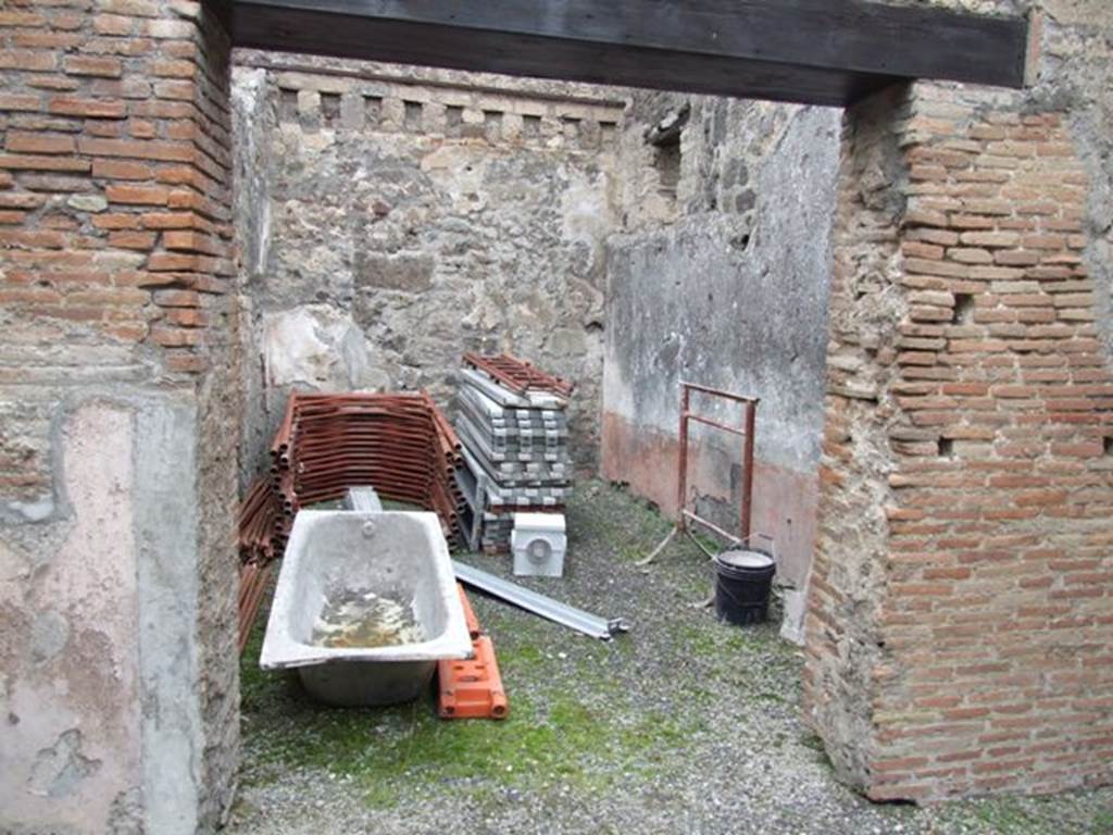 IX.3.19 Pompeii.  December 2007.  Room 13, a triclinium. According to PPP, the only known decorations of this room were in the panels, and showed vignettes of female flying figures.
According to Fiorelli, There were two tricliniums lit by windows, the first of which was decorated with two figures of Baccantes, one with thyrsus in hand and a basket on the head, the other carrying a thyrsus in the right hand and a vase in a basket in the left hand. There was also a head of Diana, facing forward, with quiver on the shoulder.
See Pappalardo, U., 2001. La Descrizione di Pompei per Giuseppe Fiorelli (1875). Napoli: Massa Editore. (p.147)
and Fiorelli, G., (1875). Descrizione di Pompei, (p.397-8) 
