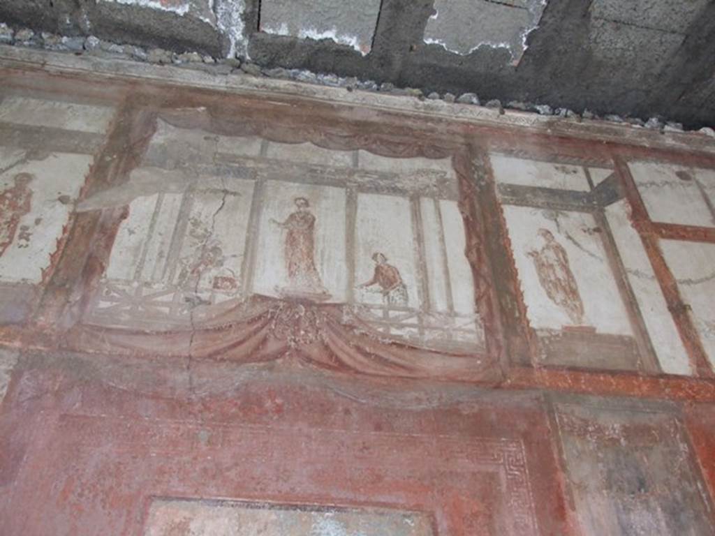 IX.5.6 Pompeii. December 2007. Room 10, east wall of tablinum. Wall painting of figures or gods at high level.
