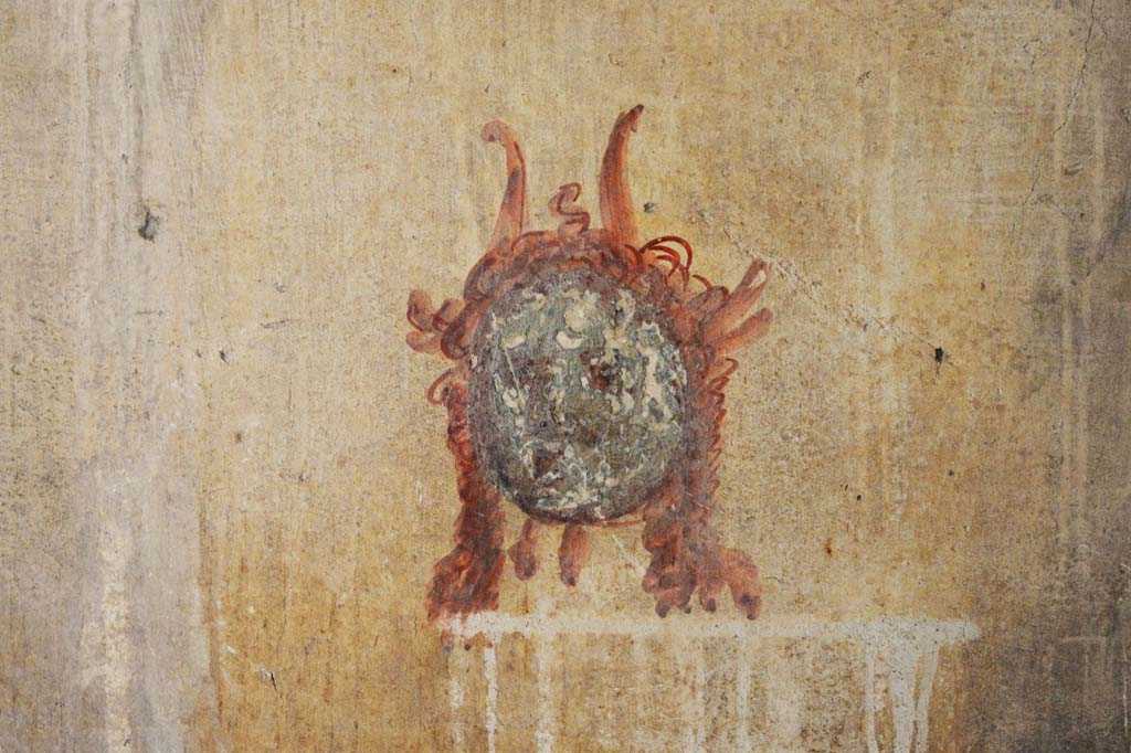 IX.5.6 Pompeii. May 2017. Room k’, painted mask from west wall at south end.
Foto Christian Beck, ERC Grant 681269 DÉCOR.