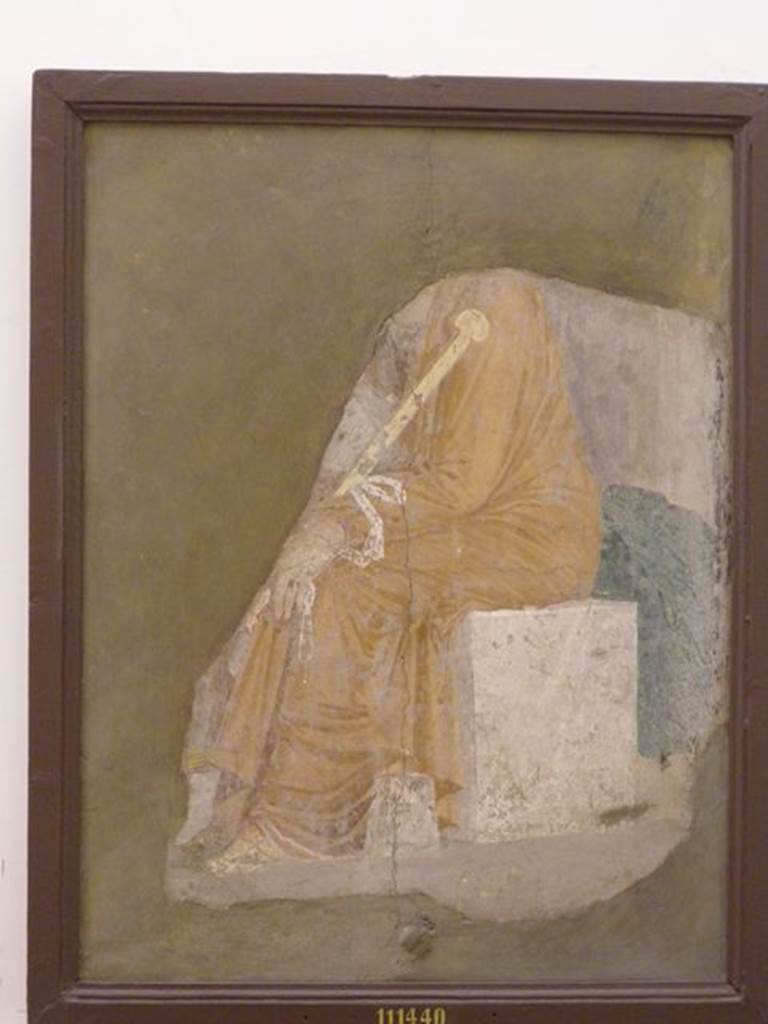 IX.5.16 Pompeii. Found on east wall of ala c', on east side of atrium.
Fragment of wall painting of seated Medea. Now in Naples Archaeological Museum. Inventory number 111440. See Bragantini, I and Sampaolo, V. 2009. La Pittura Pompeiana. Napoli, Electa. (p.225, no.84)
