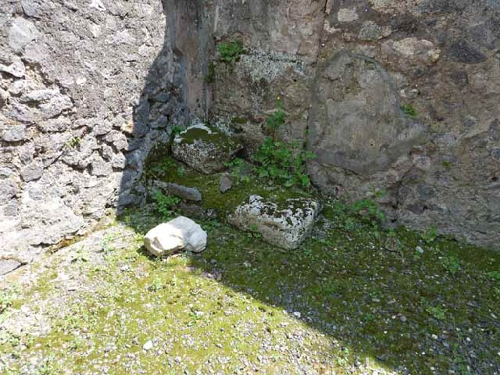 IX.8.2 Pompeii. May 2010. Base of stairs to upper floor in south-east corner of rear room.