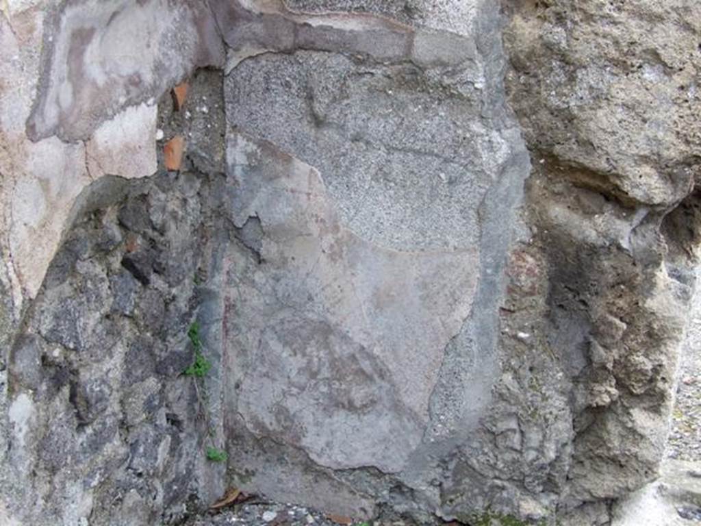 IX.8.2 Pompeii. March 2009. North west corner of base of walls of front room of shop.