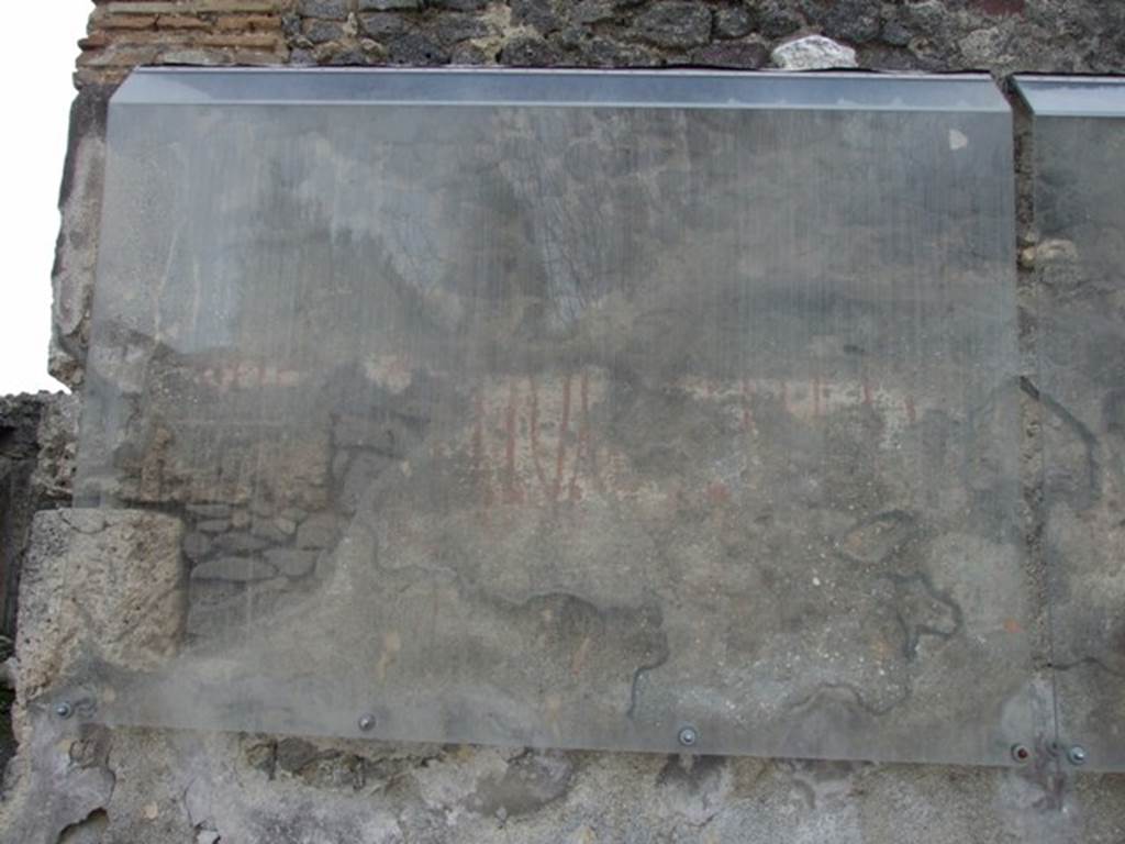 IX.8.2 Pompeii. December 2007. Remains of painted latin graffiti advertising that 10 pairs of Ateius’ gladiators would fight in the amphitheatre.