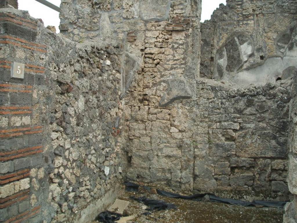IX.8.5 Pompeii. May 2005.South-east corner of shop.