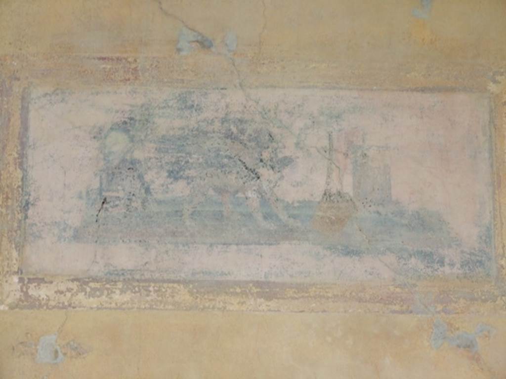 IX.8.6 Pompeii. December 2007. West portico, third panel from the north. Painted panel of the attributes of Apollo. See Schefold, K., 1957. Die Wnde Pompejis. Berlin: De Gruyter.  (p. 276).See Sogliano, A., 1879. Le pitture murali campane scoverte negli anni 1867-79. Napoli: Giannini. (p.27, no.107)