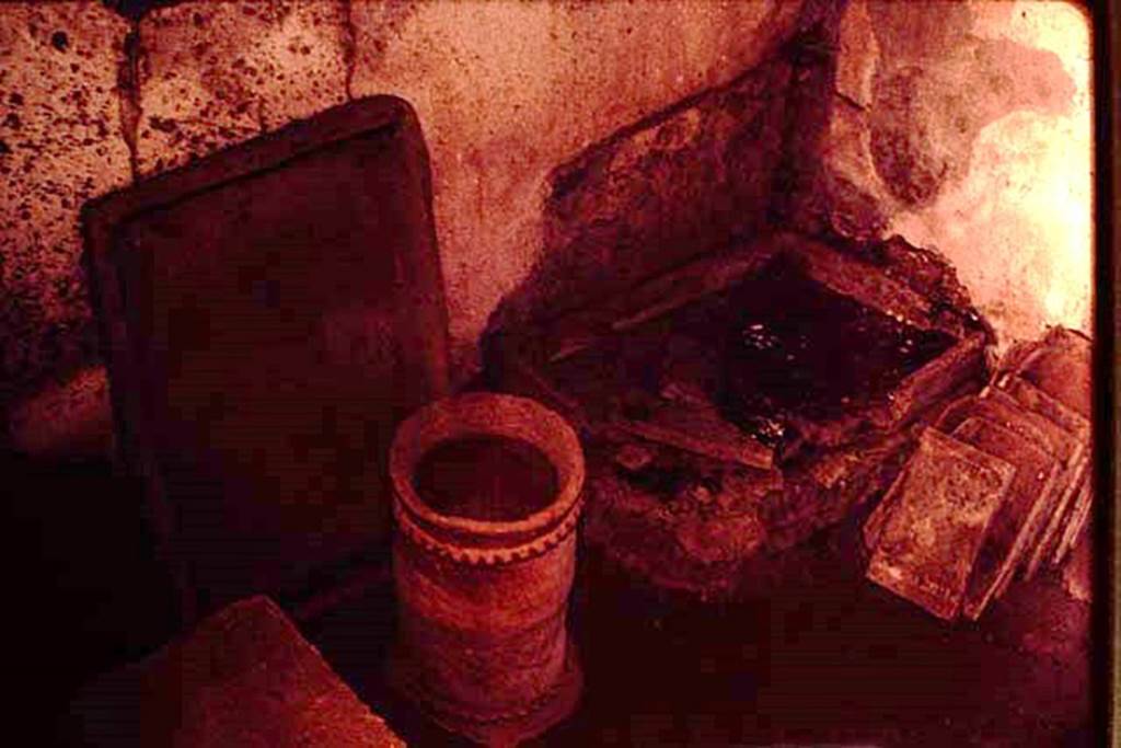 IX.9.10 Pompeii. 1964. Inside the sacellum or former kitchen. Photo by Stanley A. Jashemski.
Source: The Wilhelmina and Stanley A. Jashemski archive in the University of Maryland Library, Special Collections (See collection page) and made available under the Creative Commons Attribution-Non Commercial License v.4. See Licence and use details.
J64f1912