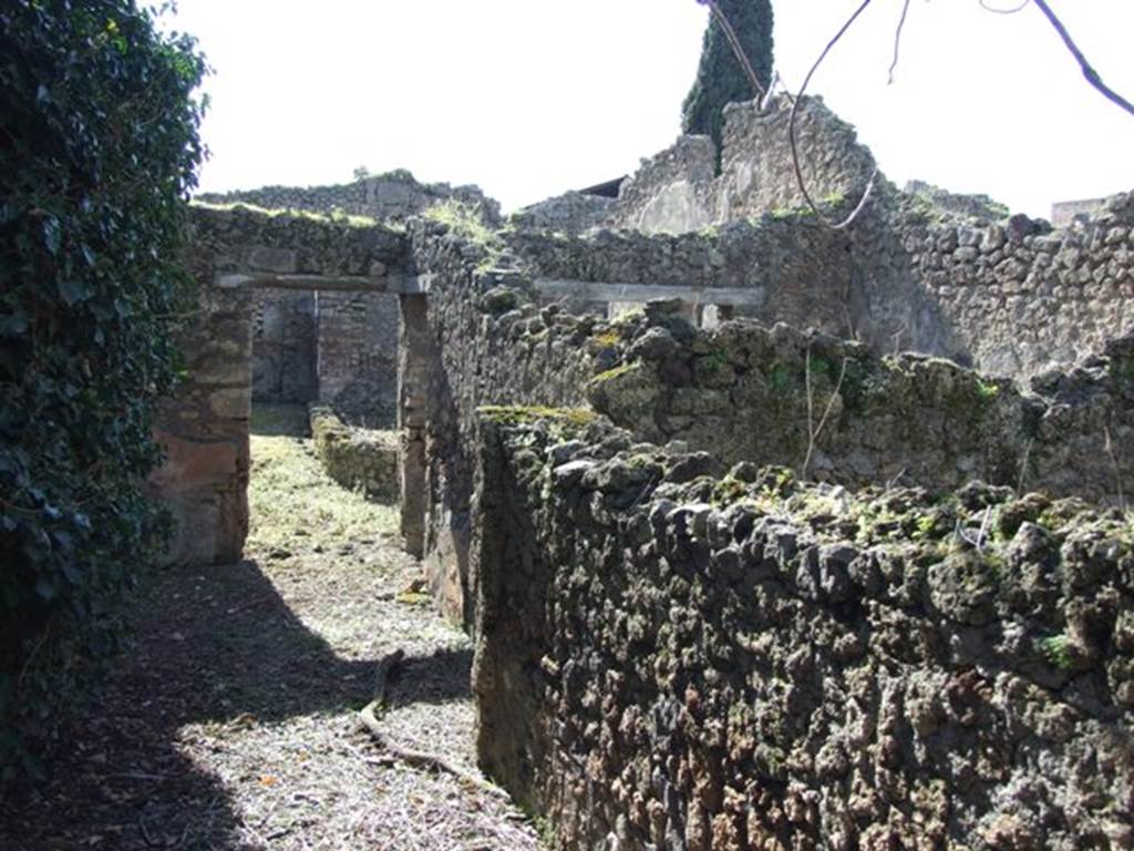 IX.9.13 Pompeii. March 2009. Entrance passageway, looking west from entrance.
