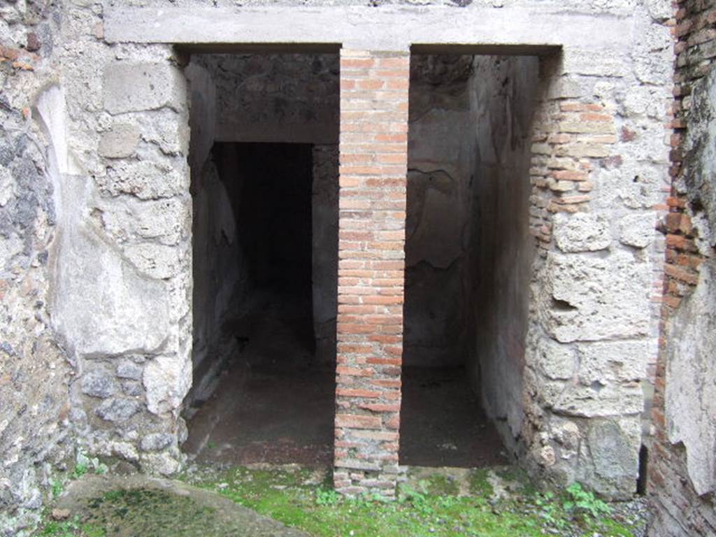 IX.9.c Pompeii. December 2005. Room with two doorways, in south-west corner of portico.
According to NdS, the need for two doorways was not understood, other than to have greater light.
See Notizie degli Scavi, 1889, p.129
