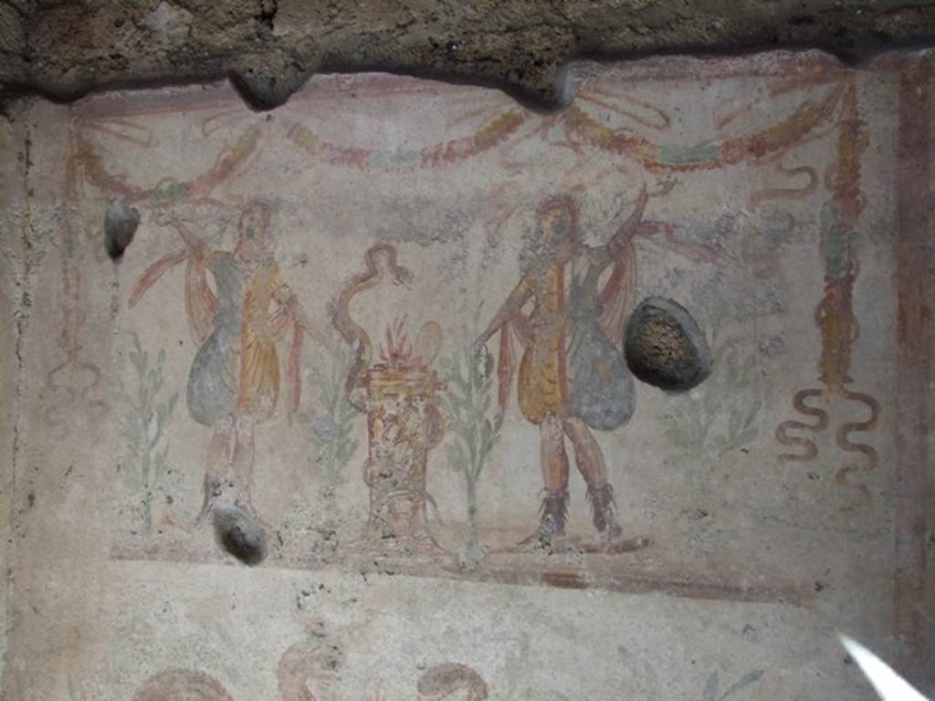 IX.9.c Pompeii.  March 2009. Lararium on North wall of Kitchen.