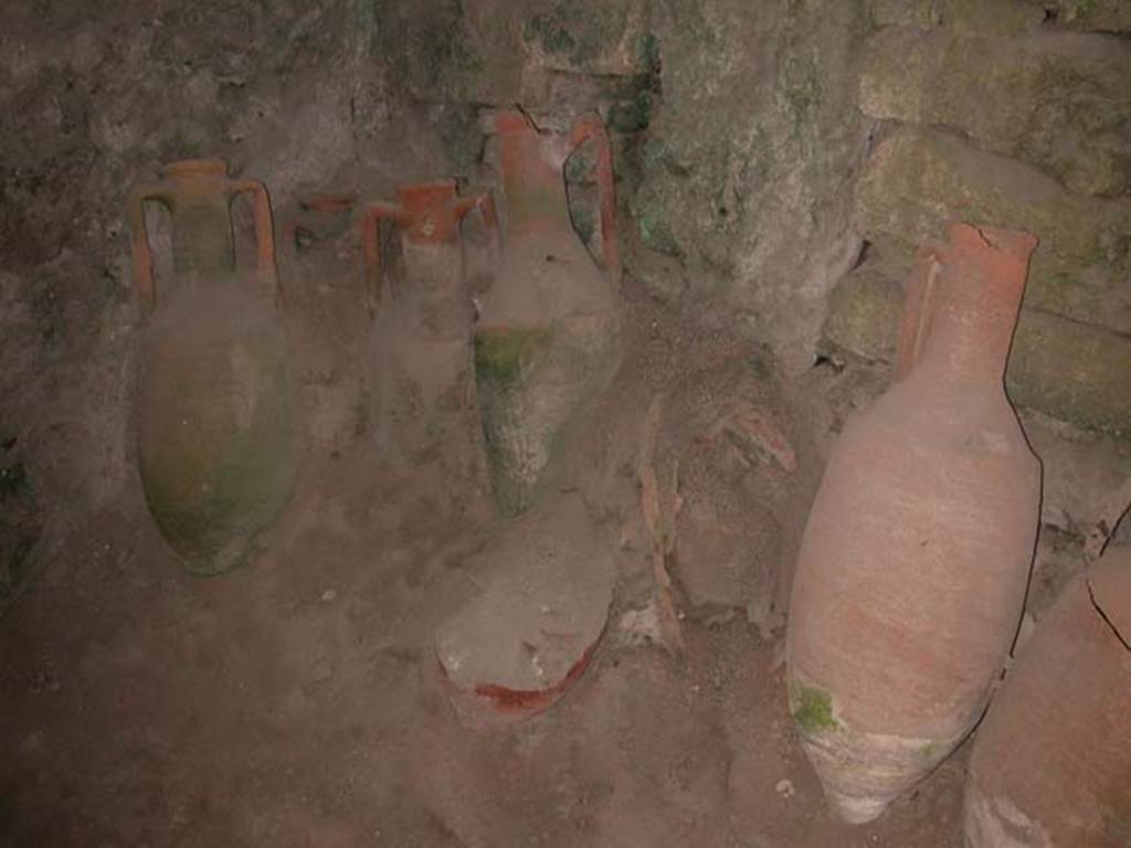 IX.11.2 Pompeii. September 2003. Amphorae at north end of east wall. Photo courtesy of Nicolas Monteix.