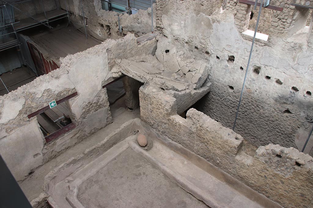 IX.12.6 Pompeii. October 2024. 
Looking north-east across room “n1” towards room “m”, upper left, and stable “n” upper right. Photo courtesy of Klaus Heese.
