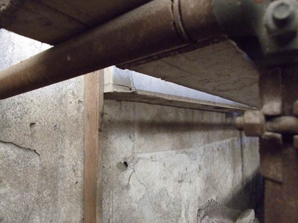 IX.12.6 Pompeii. March 2009. Room “n1”, west wall of internal garden. 
Lararium painting behind boarding, showing Hercules being presented to twelve gods in the upper part. 
Underneath are 2 serpents approaching an altar.
See Nappo, S., 1998. Pompeii: Guide to the lost City. London: Weidenfeld and Nicolson. (p.57).

