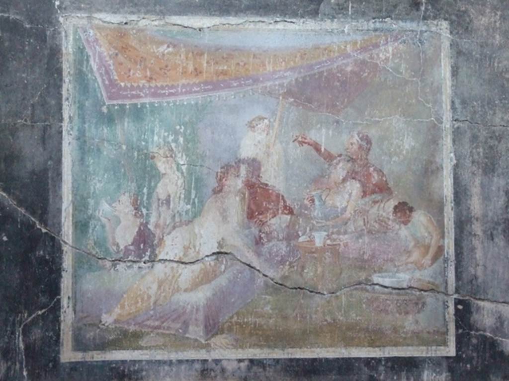 IX.12.6 Pompeii. March 2009. Room “m”, north wall of triclinium. Painting of banqueting scene.

