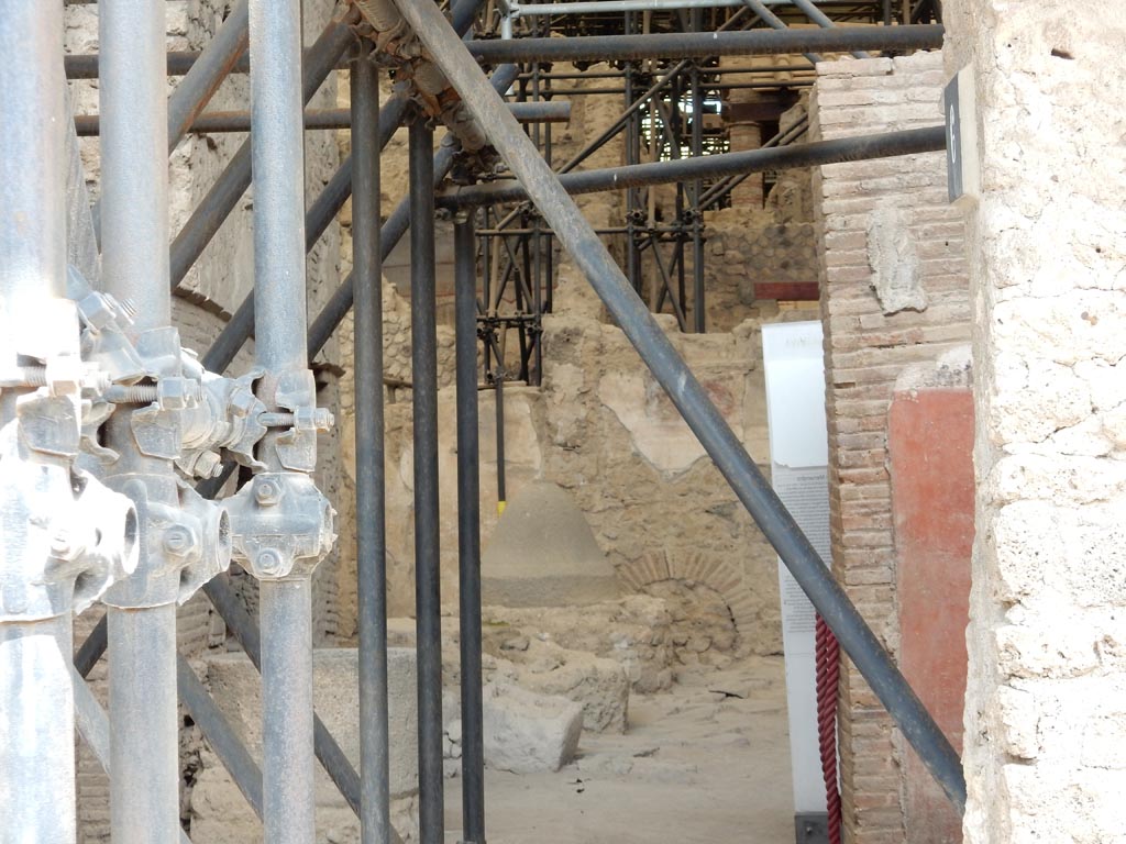 IX.12.6 Pompeii, May 2018. Room “f”, bakery, looking north from entrance doorway in room “b”. Photo courtesy of Buzz Ferebee.