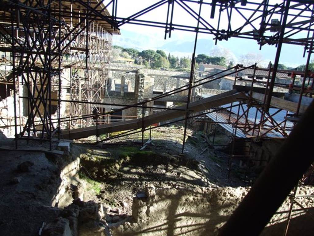 IX.12.9 Pompeii. March 2009. Looking south along west side of insula towards rear of IX.12.5, 4, 3, 2 and 1.