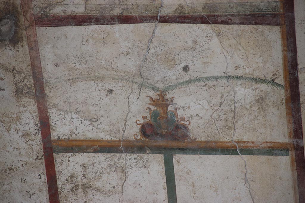 IX.12.9 Pompeii. October 2024. Room 13, detail from upper north wall. Photo courtesy of Klaus Heese.