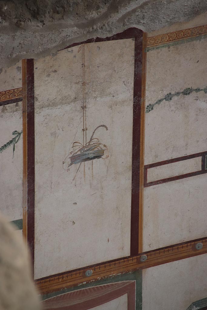 IX.12.9 Pompeii. October 2024. 
Room 13, detail from upper east wall at north end. Photo courtesy of Klaus Heese.
