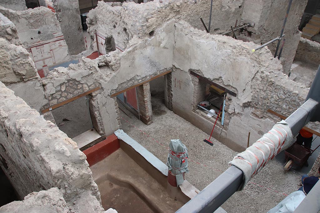 IX.12.B Pompeii. October 2024.
Room 15, looking south-west towards doorway to room 16, in centre, and window into room 8, centre right. Photo courtesy of Klaus Heese.