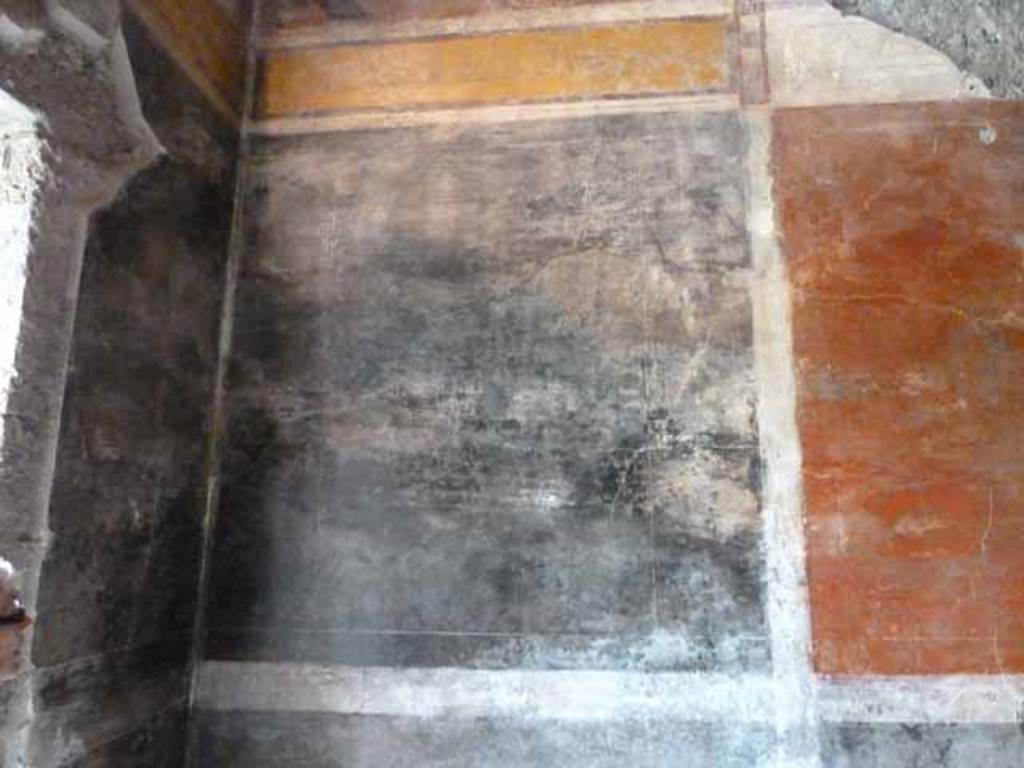 IX.13.1-3 Pompeii. May 2010. Room 13, west wall in south west corner.
