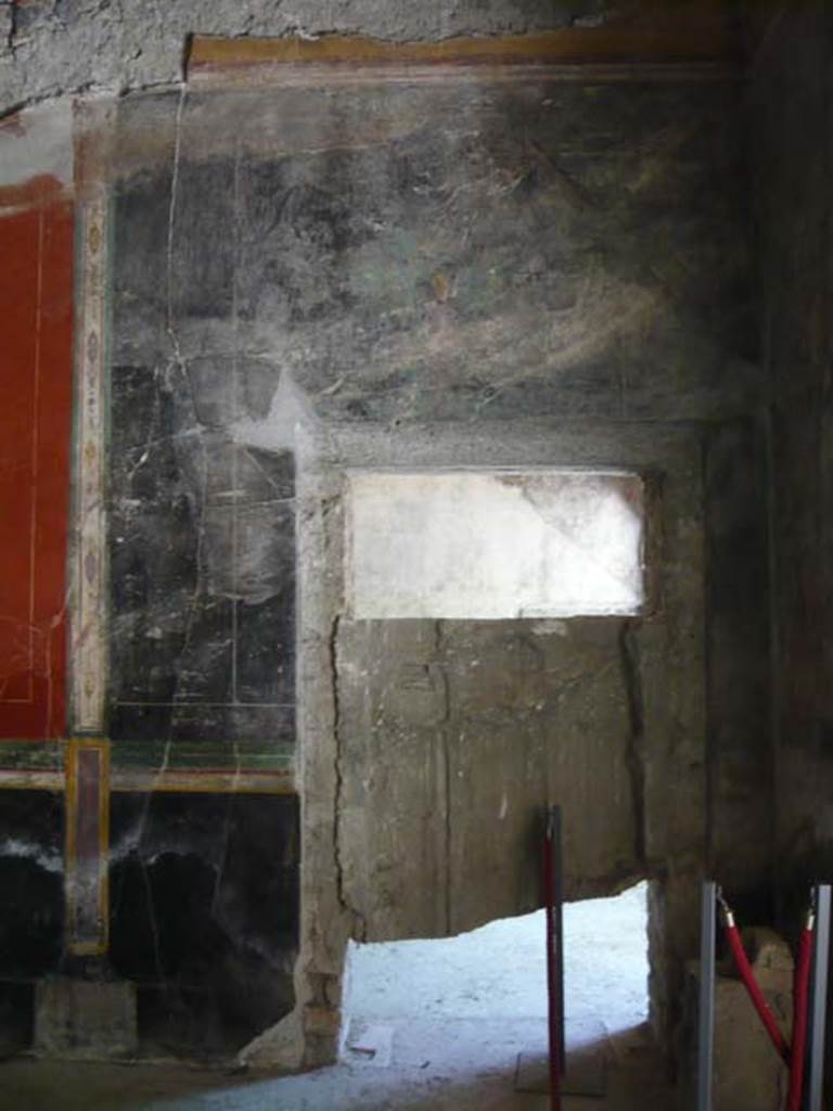 IX.13.1-3 Pompeii. Mary 2012. Room 13, plaster cast of door in east wall.
Photo courtesy of Buzz Ferebee.