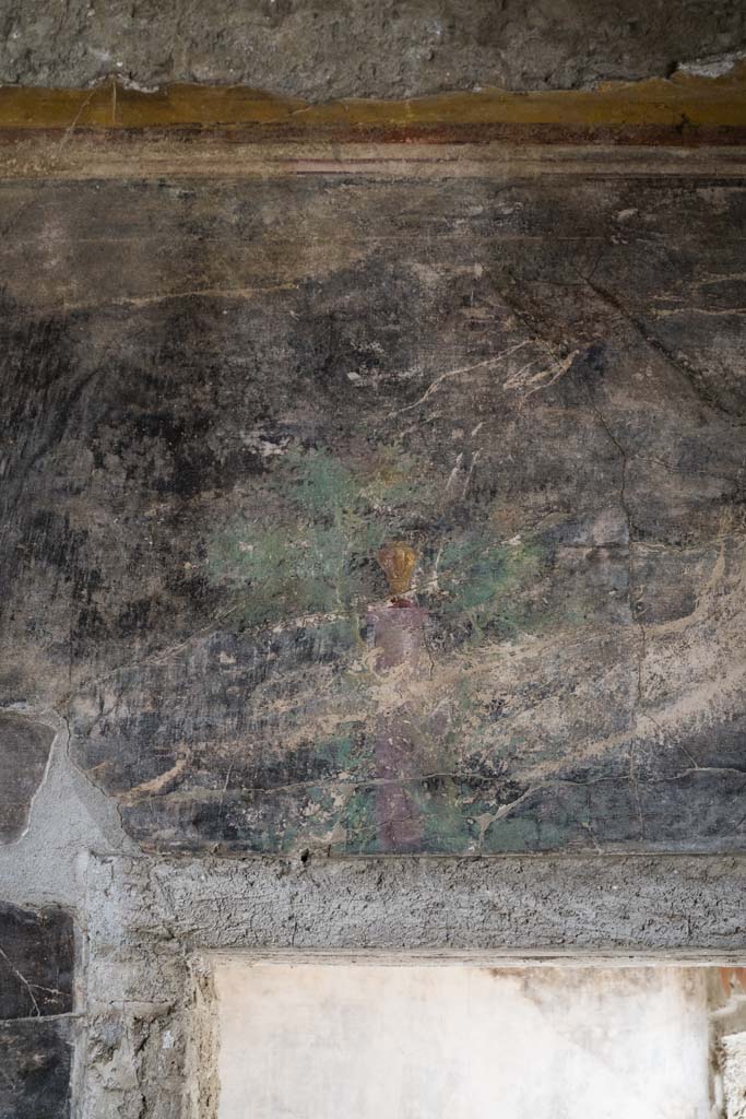 IX.13.1-3 Pompeii. April 2022.
Room 13, looking towards upper east wall above doorway to room 12.
Photo courtesy of Johannes Eber
