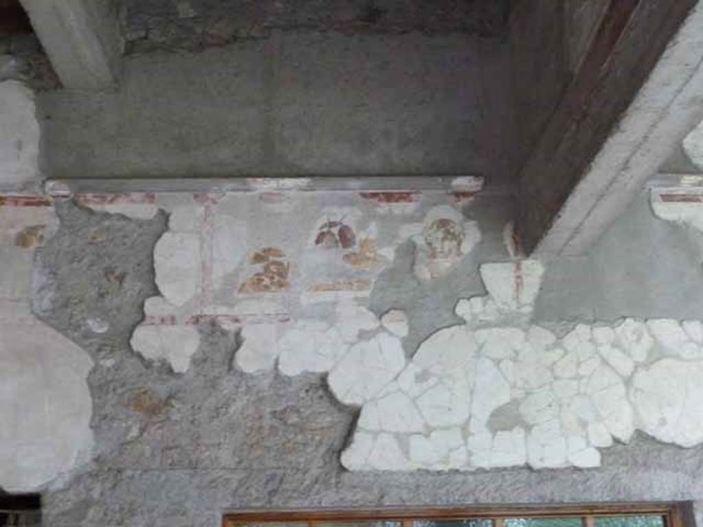 IX.13.1-3 Pompeii. May 2010. Room 9, upper south wall above room 14.